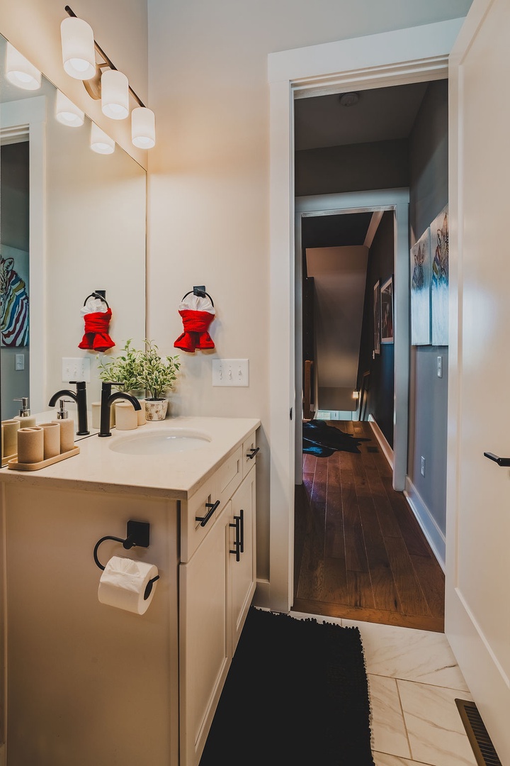 Second full bathroom with shower and tub combo