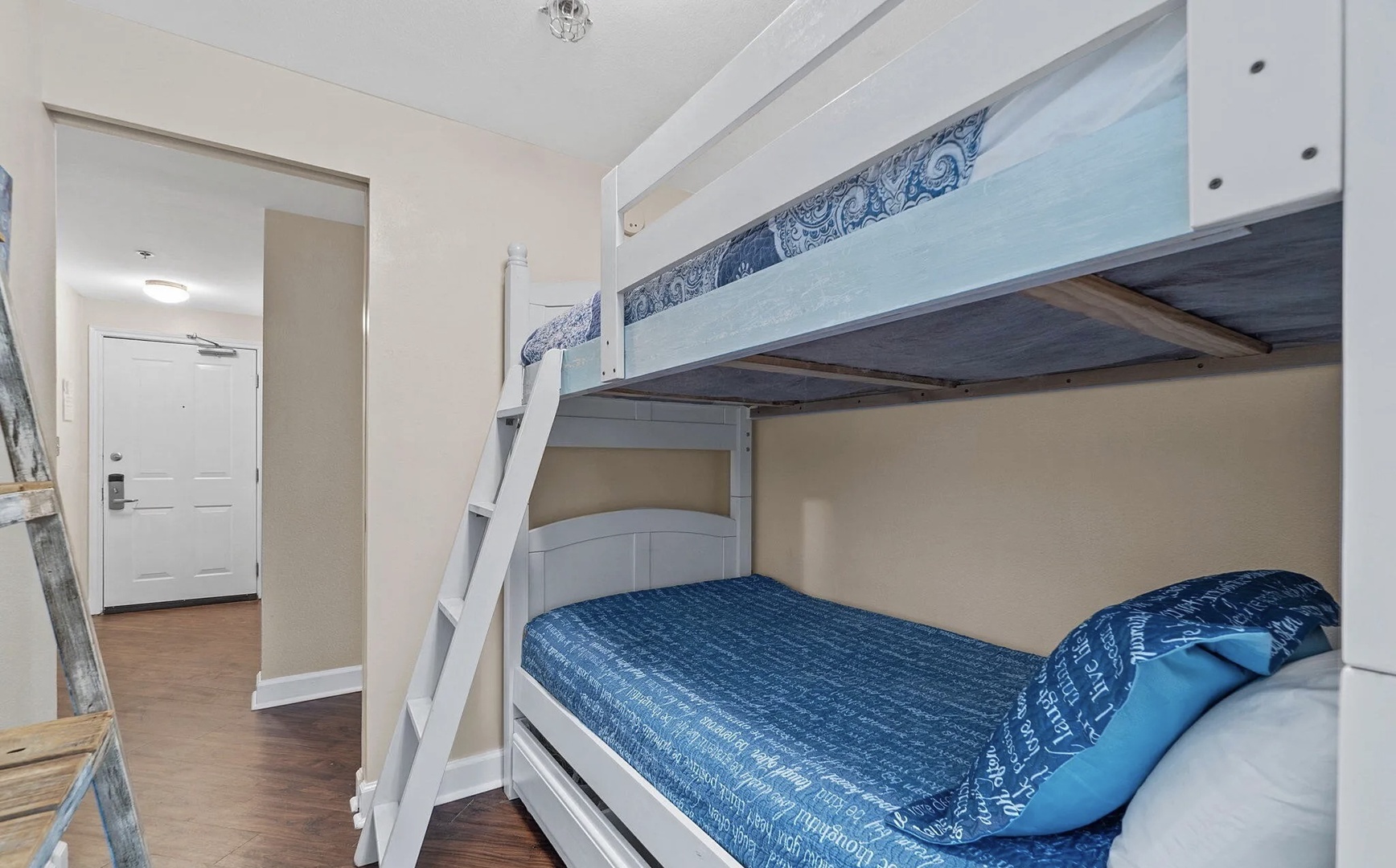 Bunk space with two twin beds and attached bathroom.