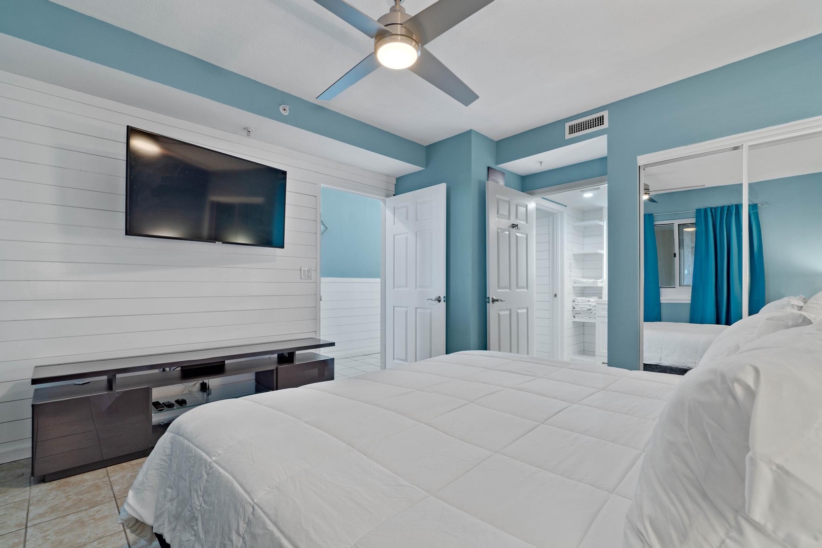 Ensuite bedroom with flat screen Tv
