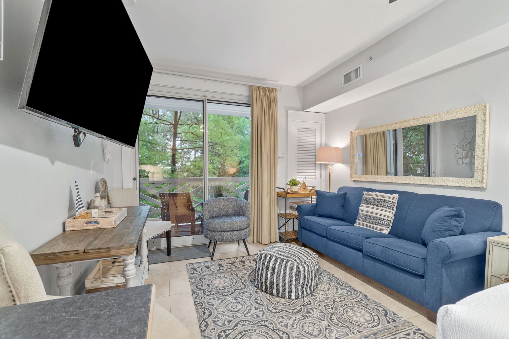 Living area with sleeper sofa and tv