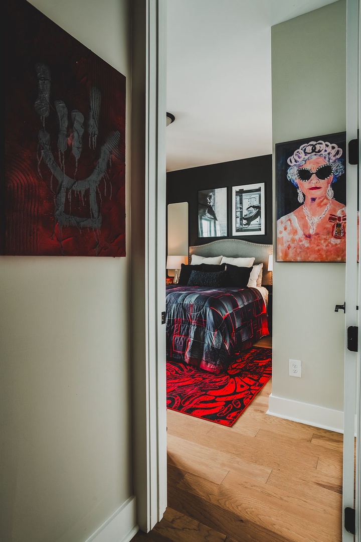 Second bedroom with queen bed and TV