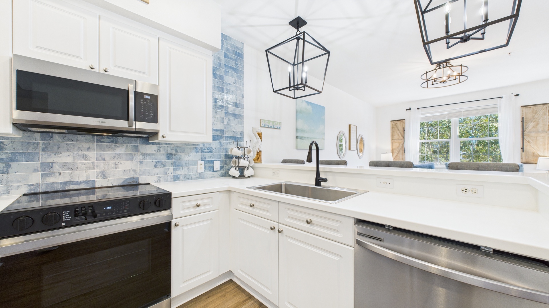 Full kitchen with stainless appliances and all the cooking essentials