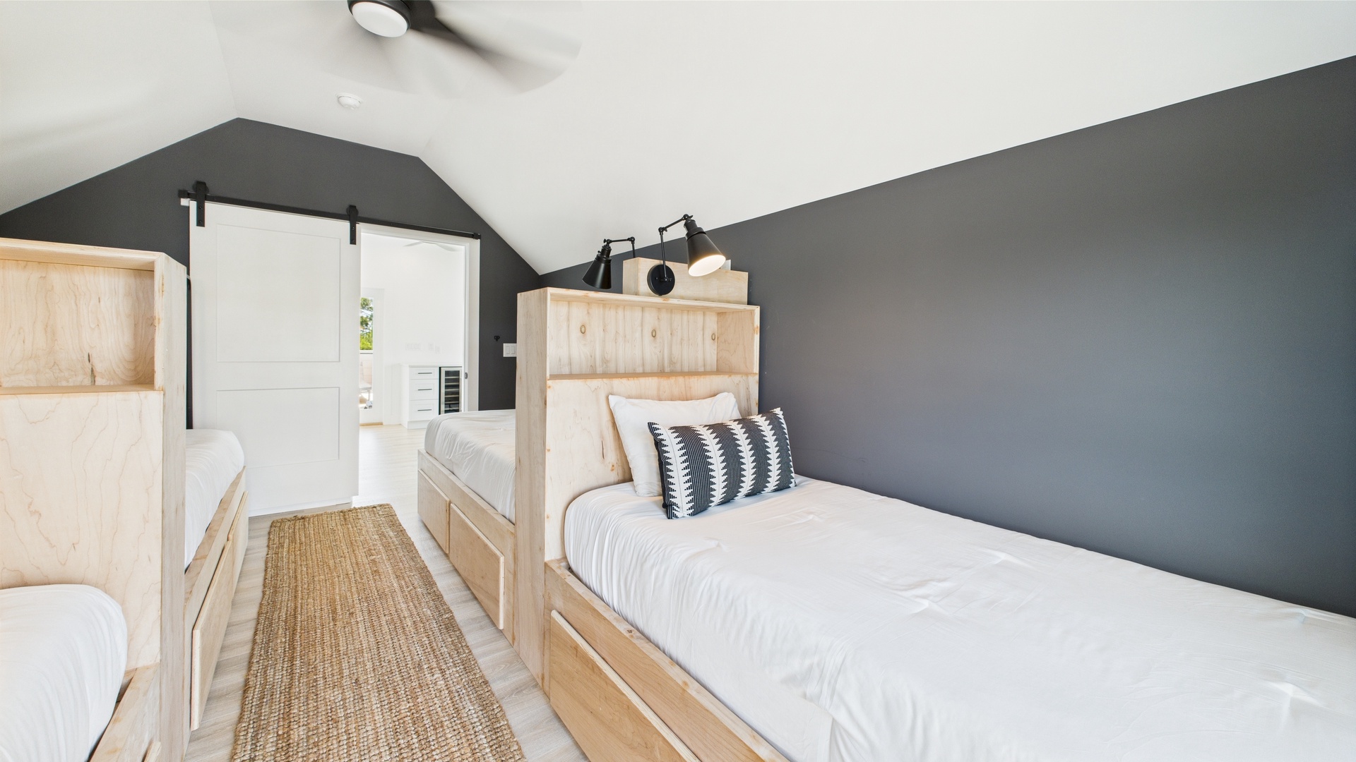 Fourth bedroom with four twin beds and balcony access