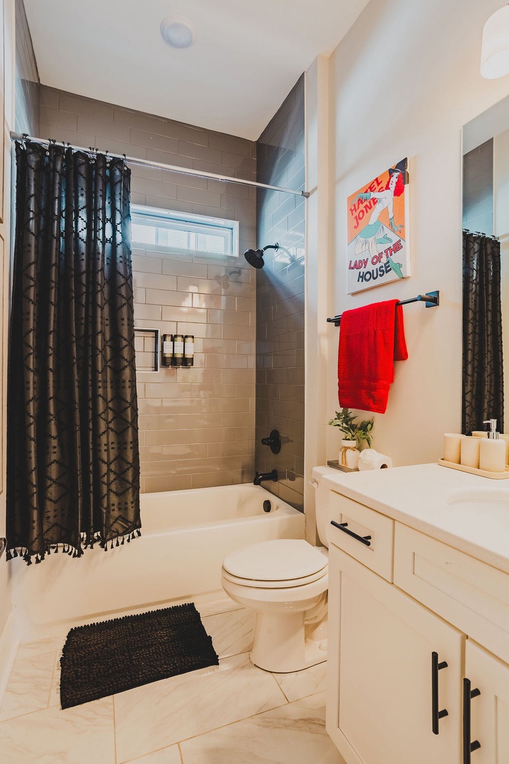 Second full bathroom with shower and tub combo