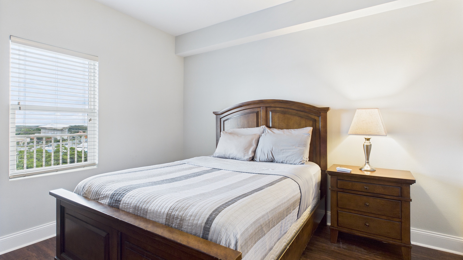 Primary guest bedroom with queen bed and ensuite bathroom (sleeps 2)