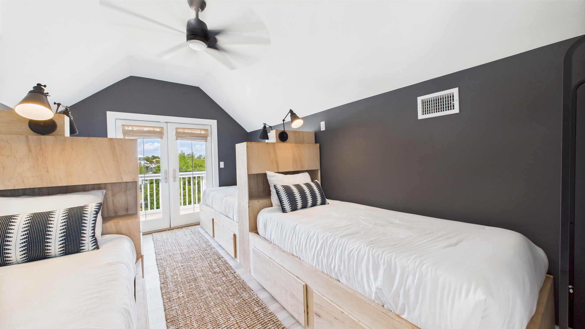 Fourth bedroom with four twin beds and balcony access