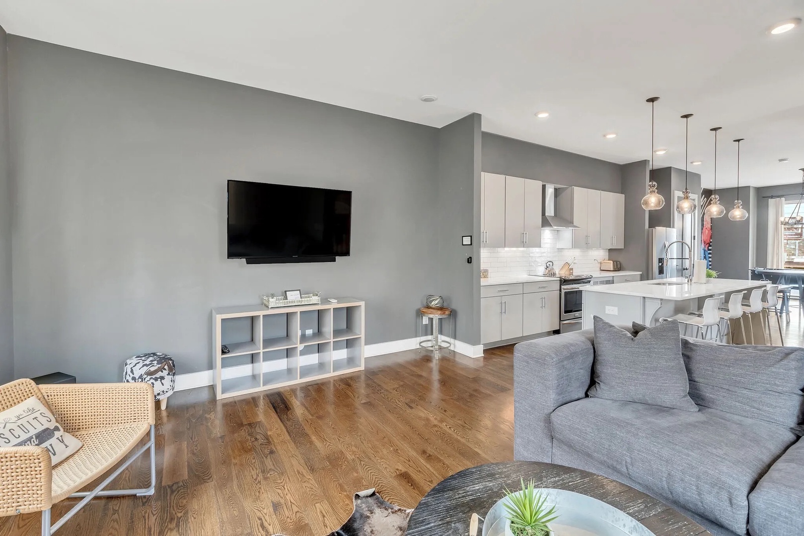 Living area with stylish furnishings TV and sofa bed