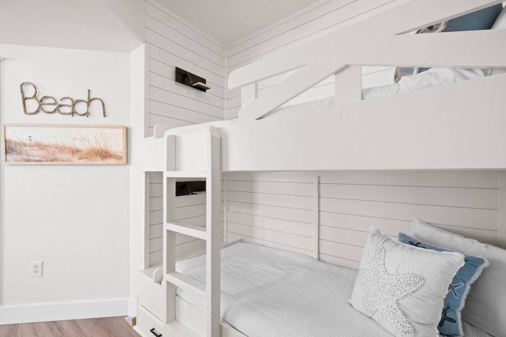 Bunk nook in hallway with twin-over-twin bunk