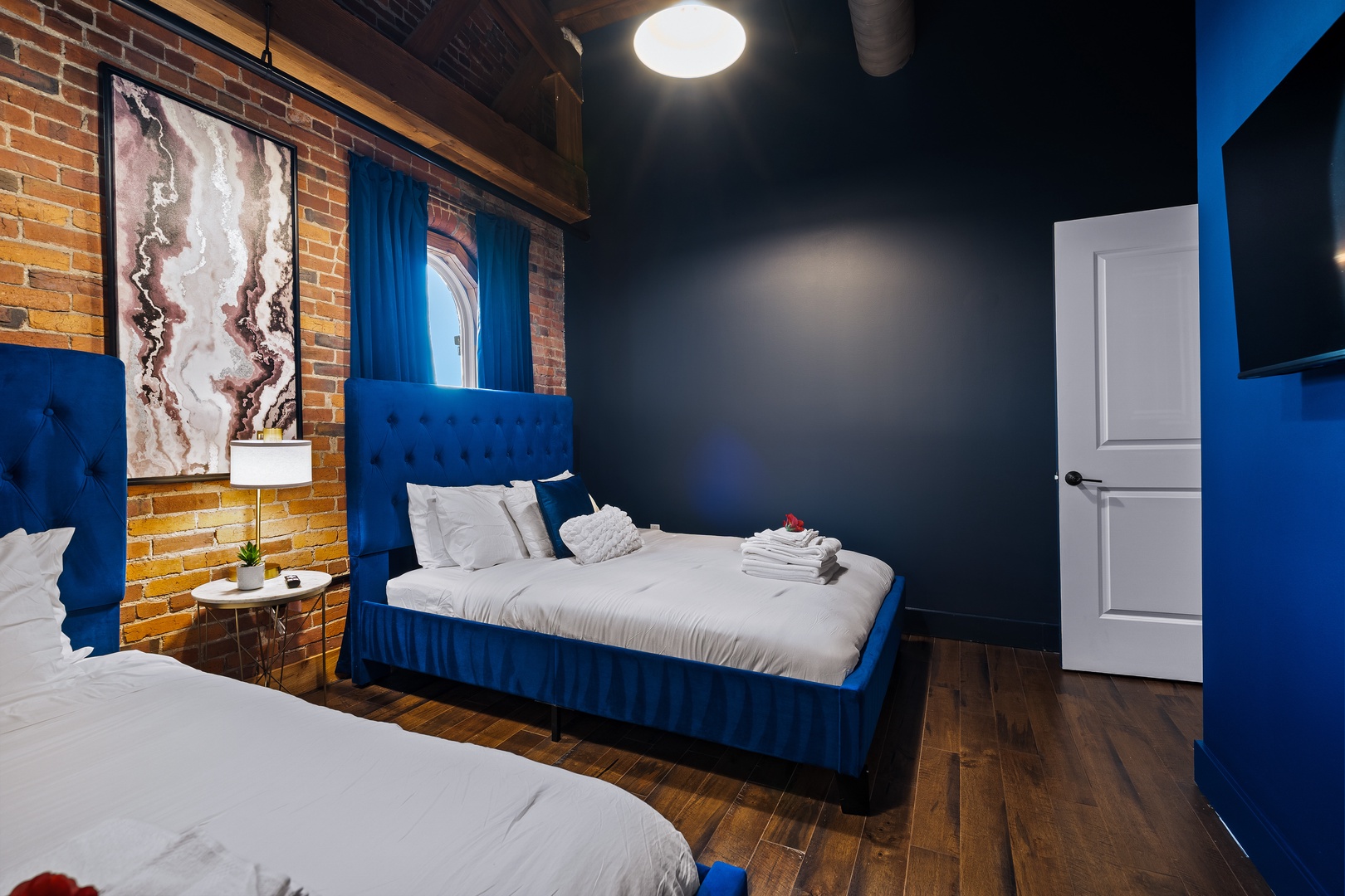 Primary bedroom with 2 queen beds