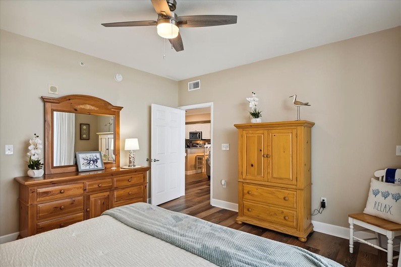 Primary bedroom with king bed and ensuite bathroom