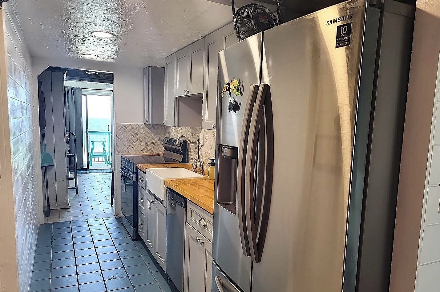 Full kitchen with updated appliances and cooking essentials