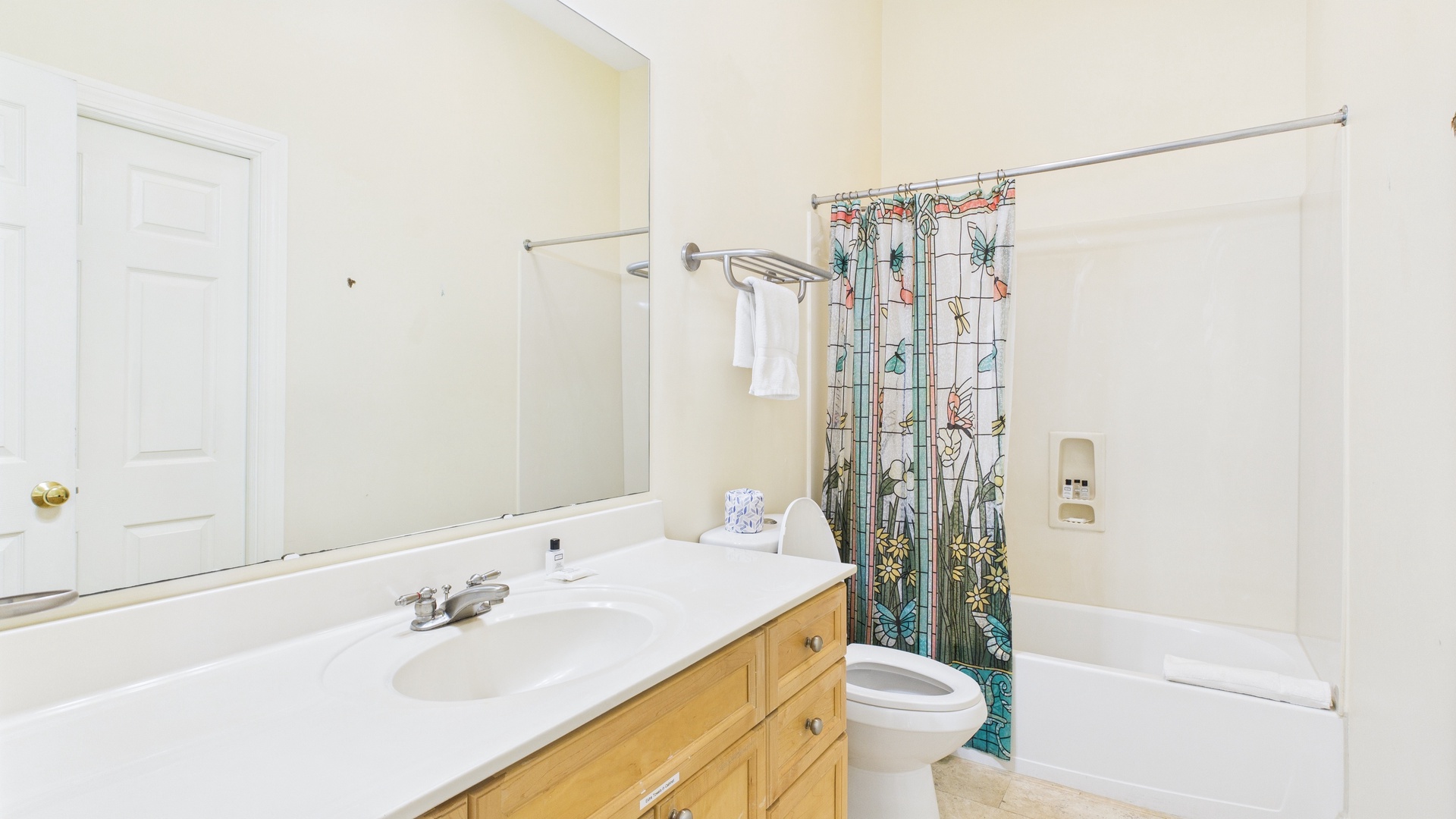 Full bathroom with shower and tub combo