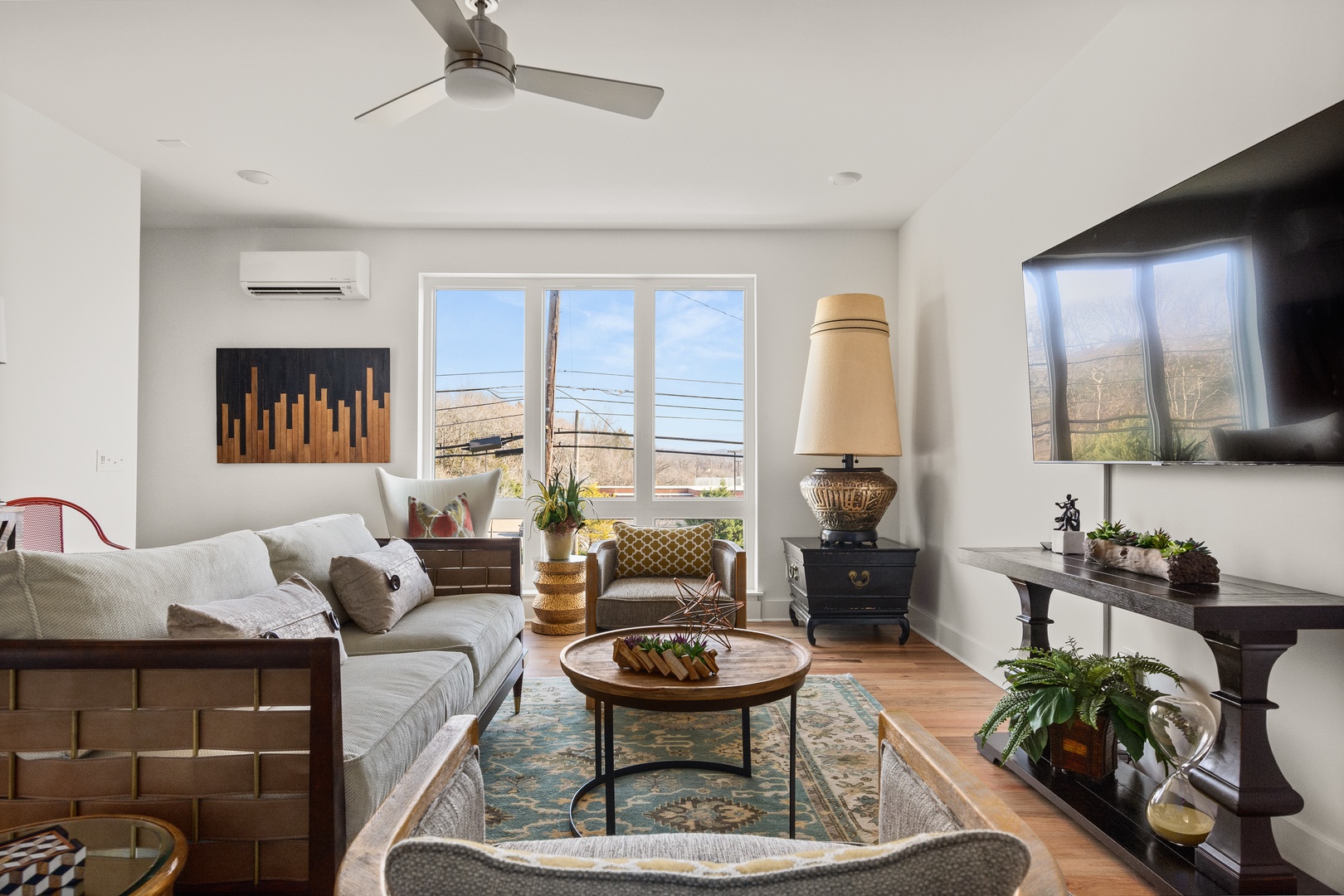 Living room area with Large Smart TV
