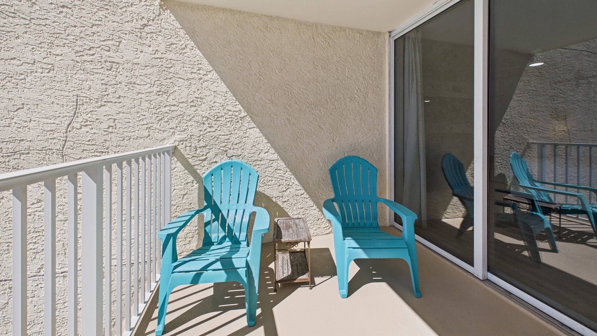 Private balcony with seating and scenic views