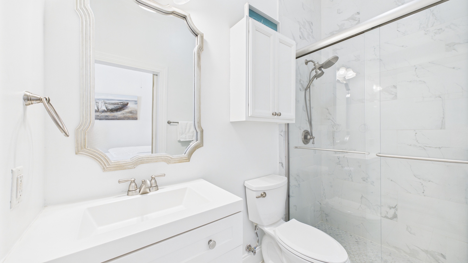 Bathroom with beautiful walk in shower and vanity