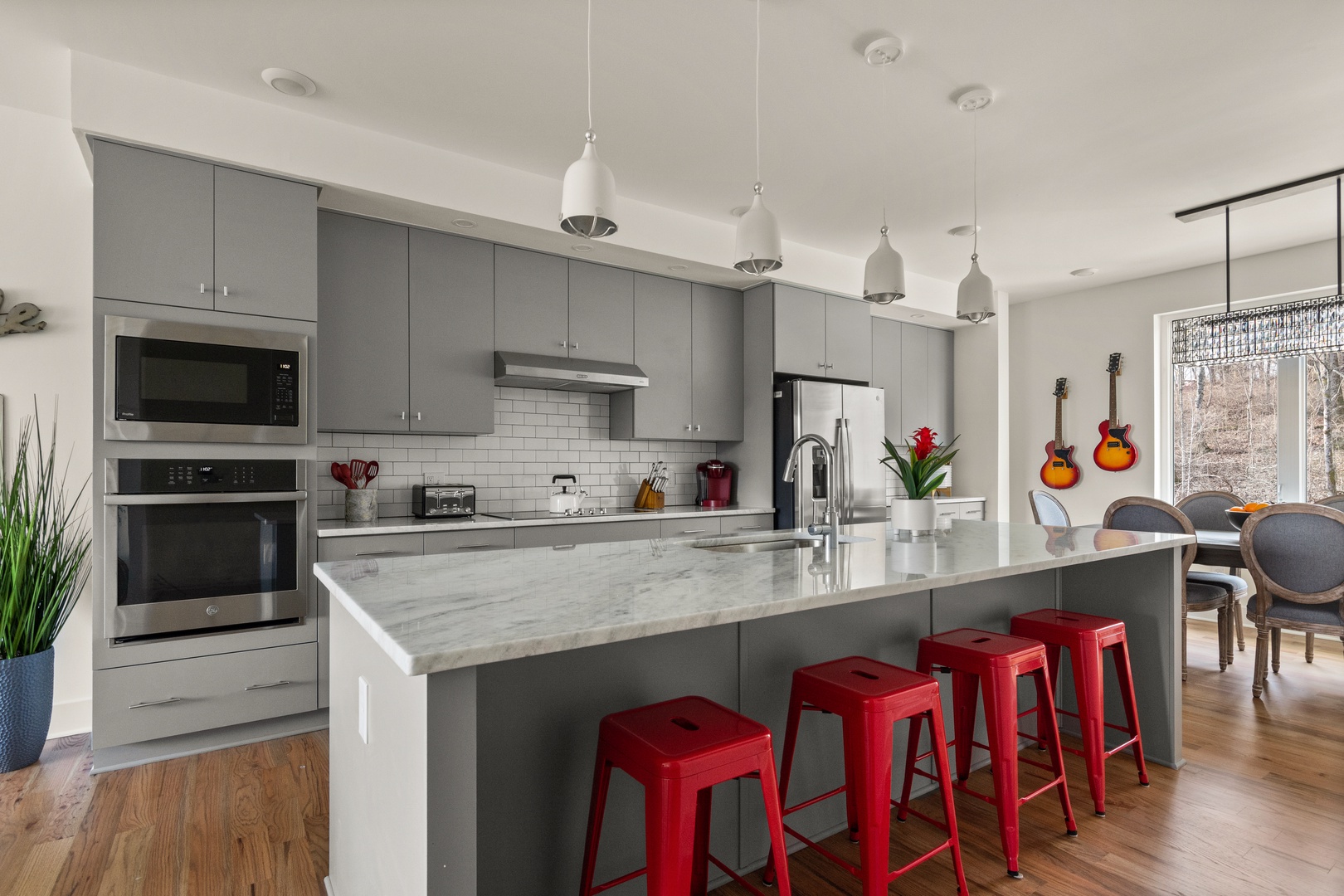 Kitchen area with barstools
