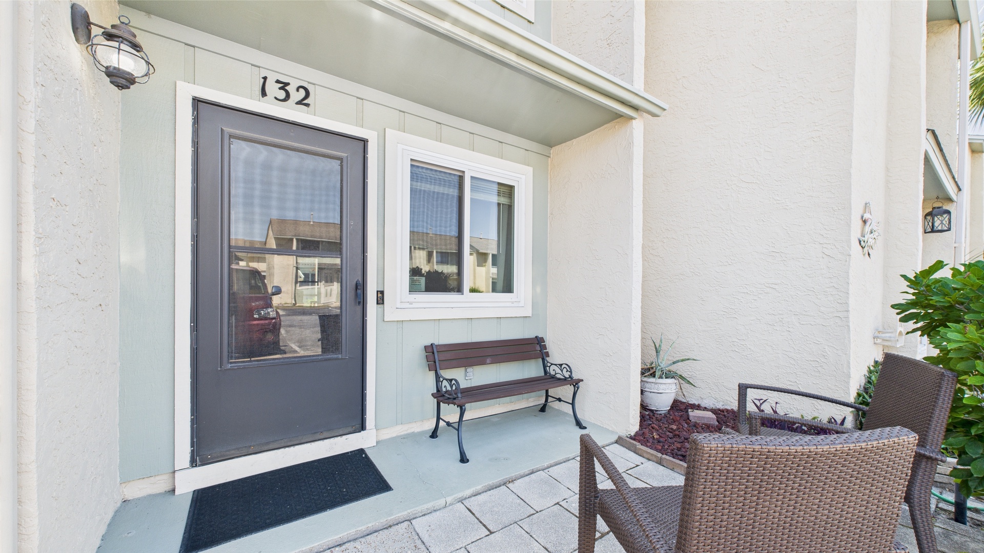 Front entry-way with patio and seating
