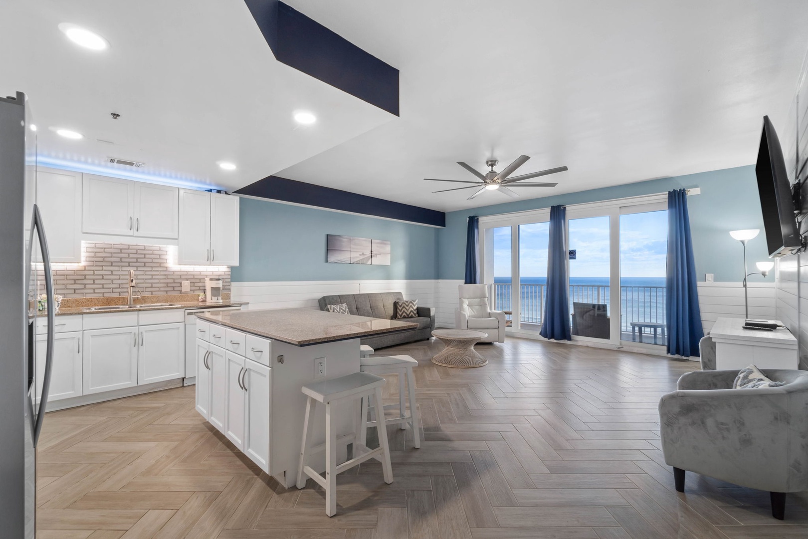 Living room and kitchen area with gulf view