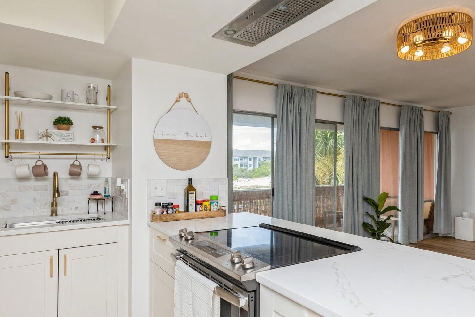 Updated stainless appliances with needed cooking supplies