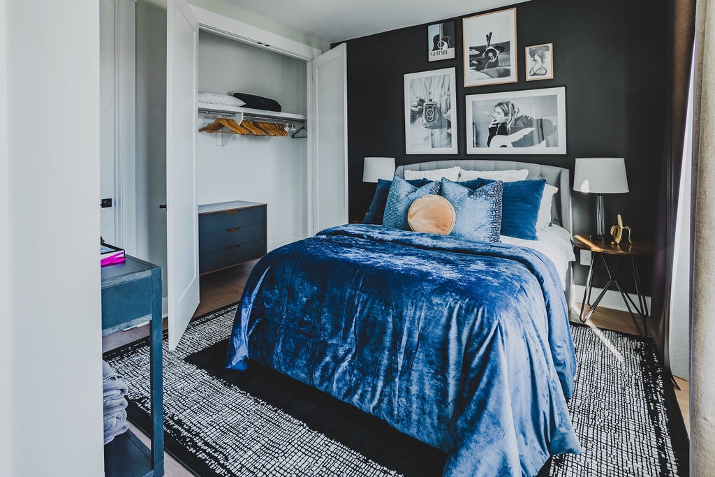 Fourth bedroom with queen bed and ensuite shared bathroom