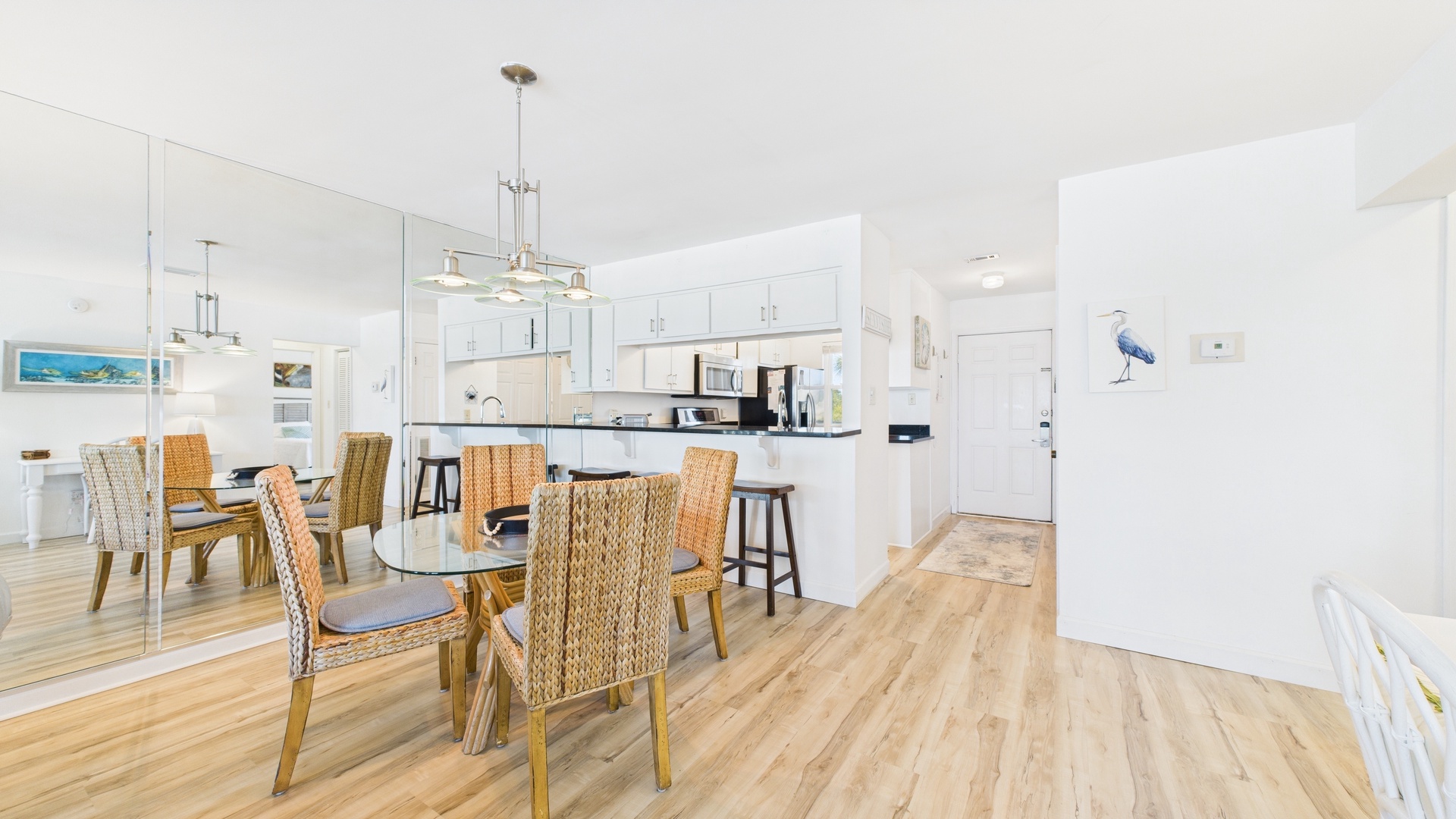 Dining area with table and breakfast bar