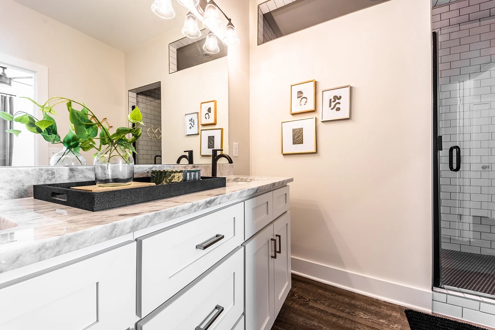 Master bathroom with walk in shower and dual vanity