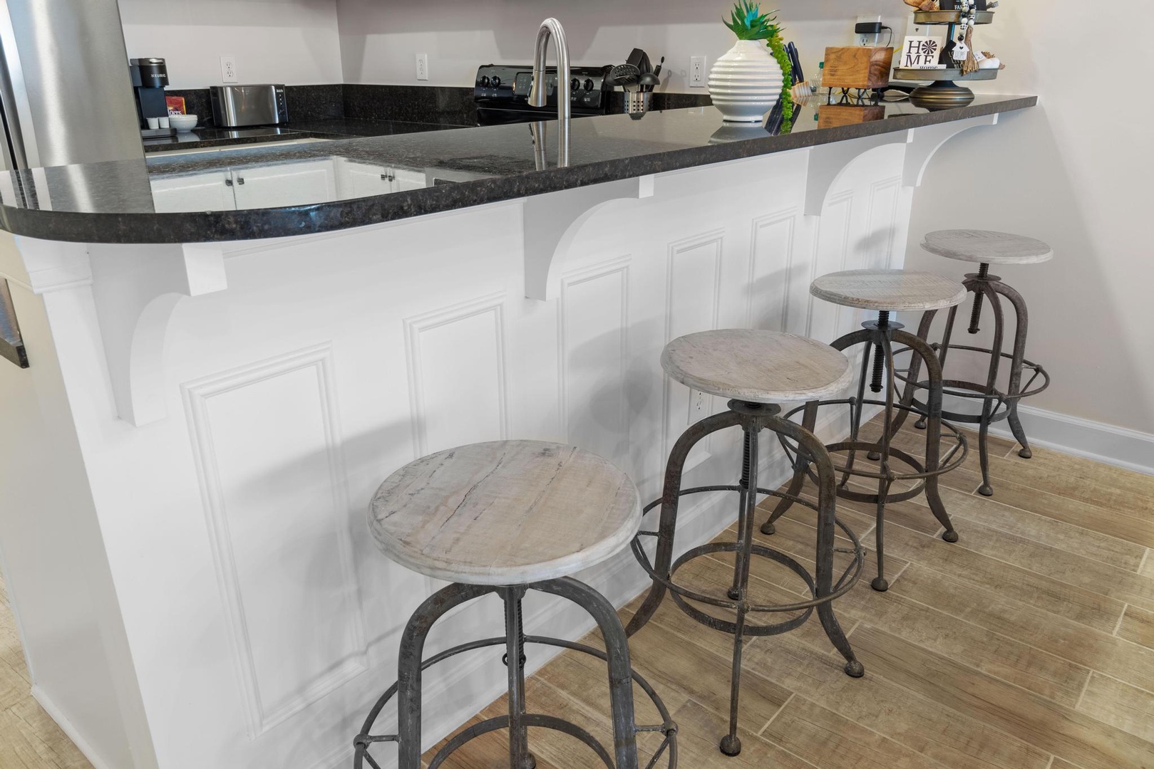 Kitchen area with bar seating