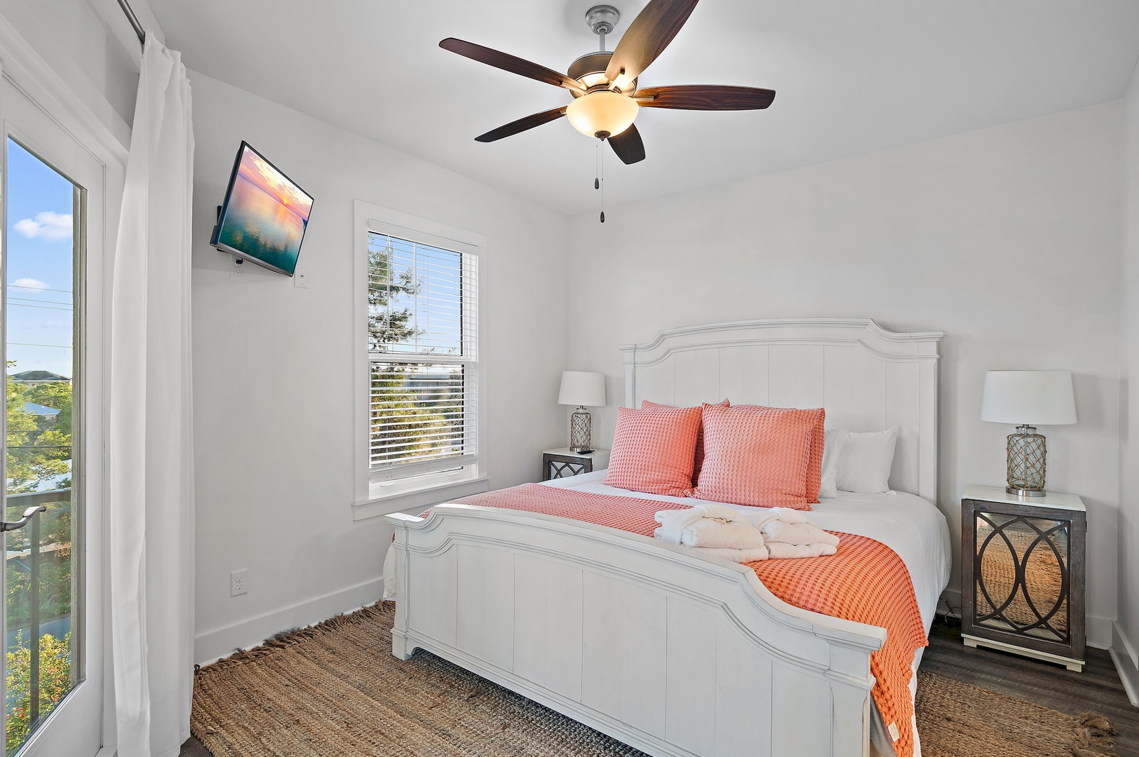 Queen bedroom with balcony access