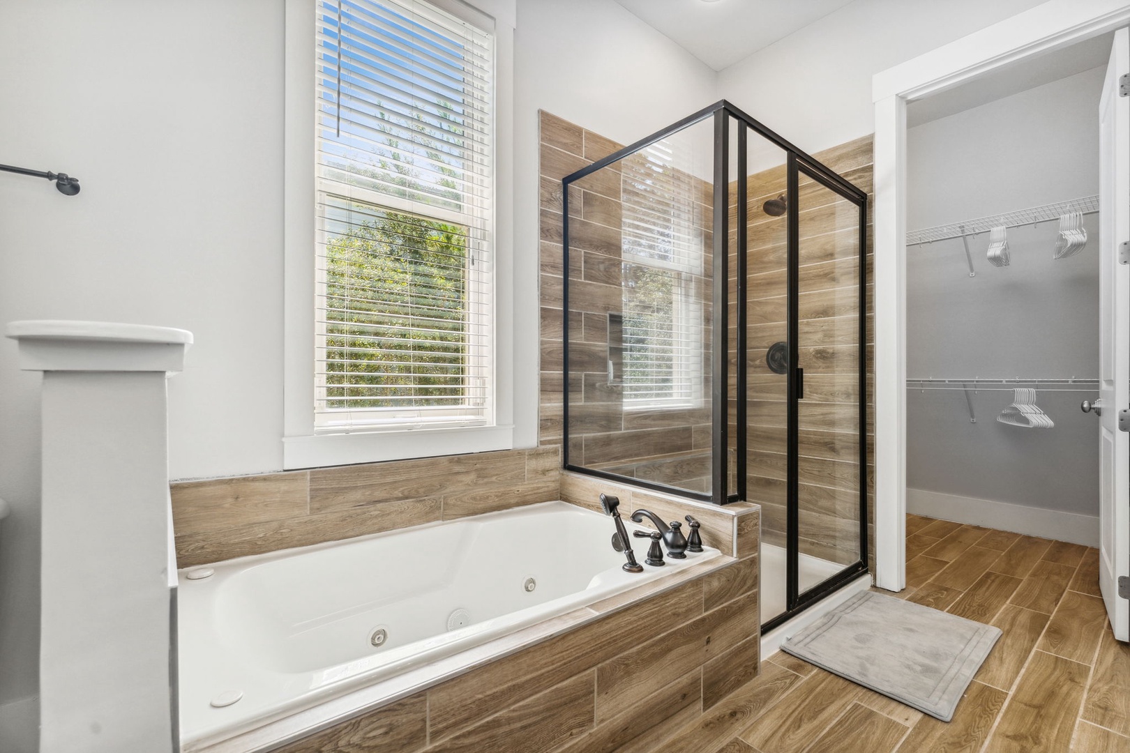 Master Bathroom with tub and stand up shower