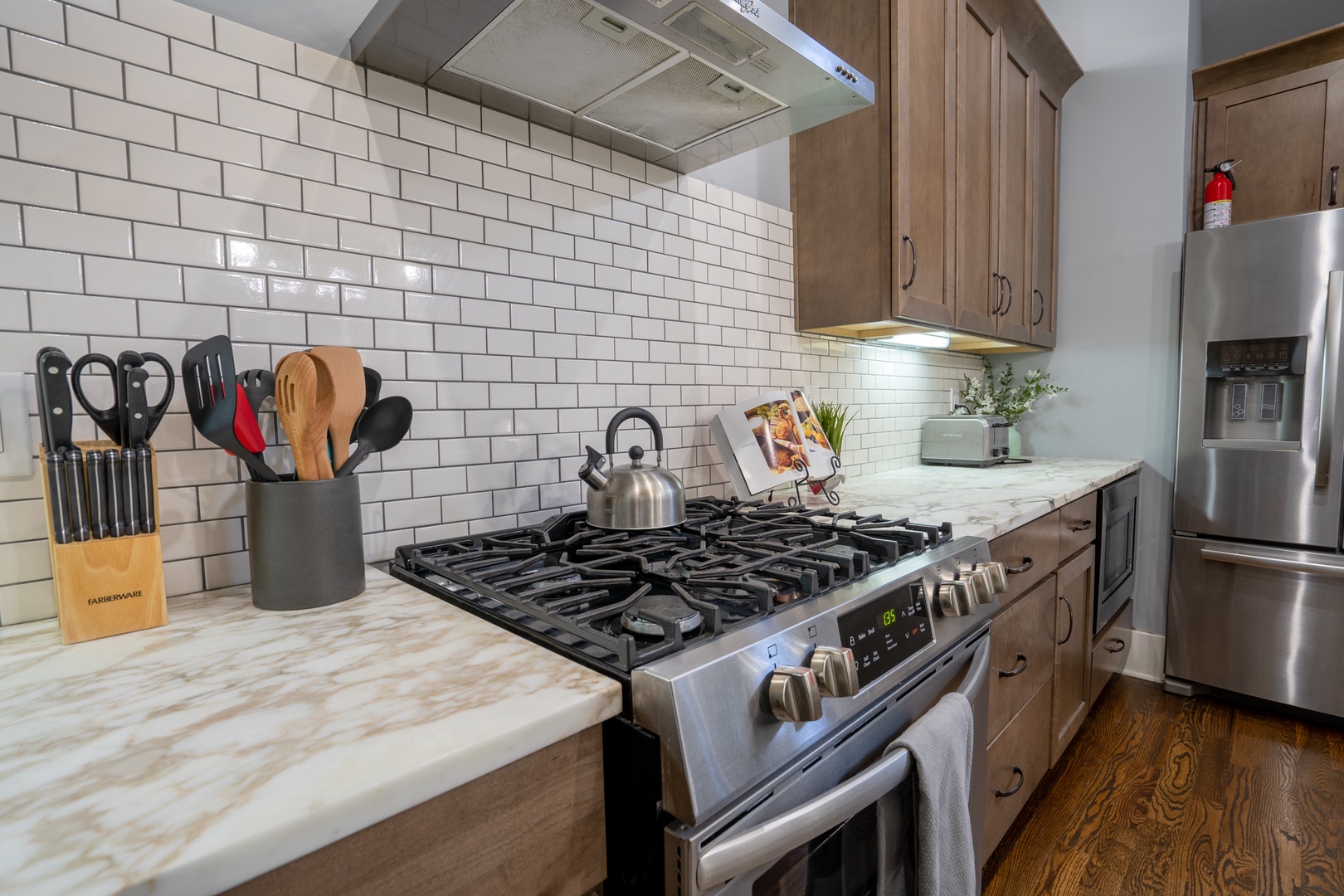 Kitchen area with oven and range
