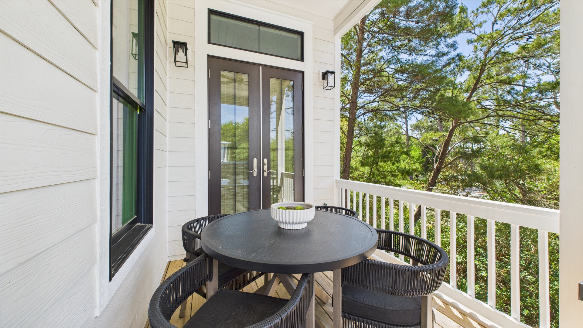 Terrace on first floor with dining table and grills