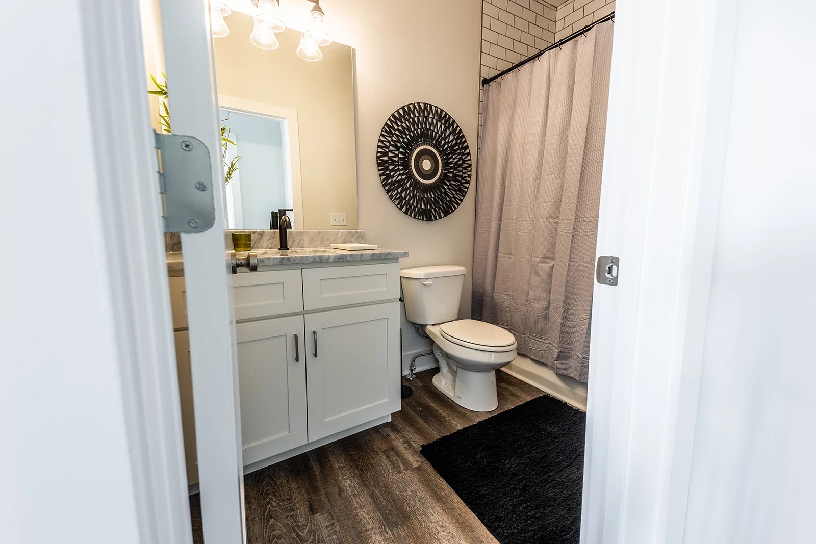 Third bathroom with shower and tub combo