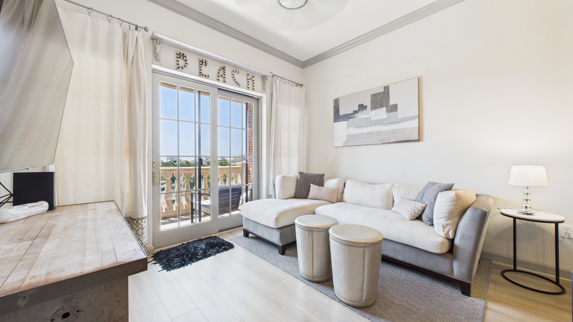 Open concept living area with stylish furnishings