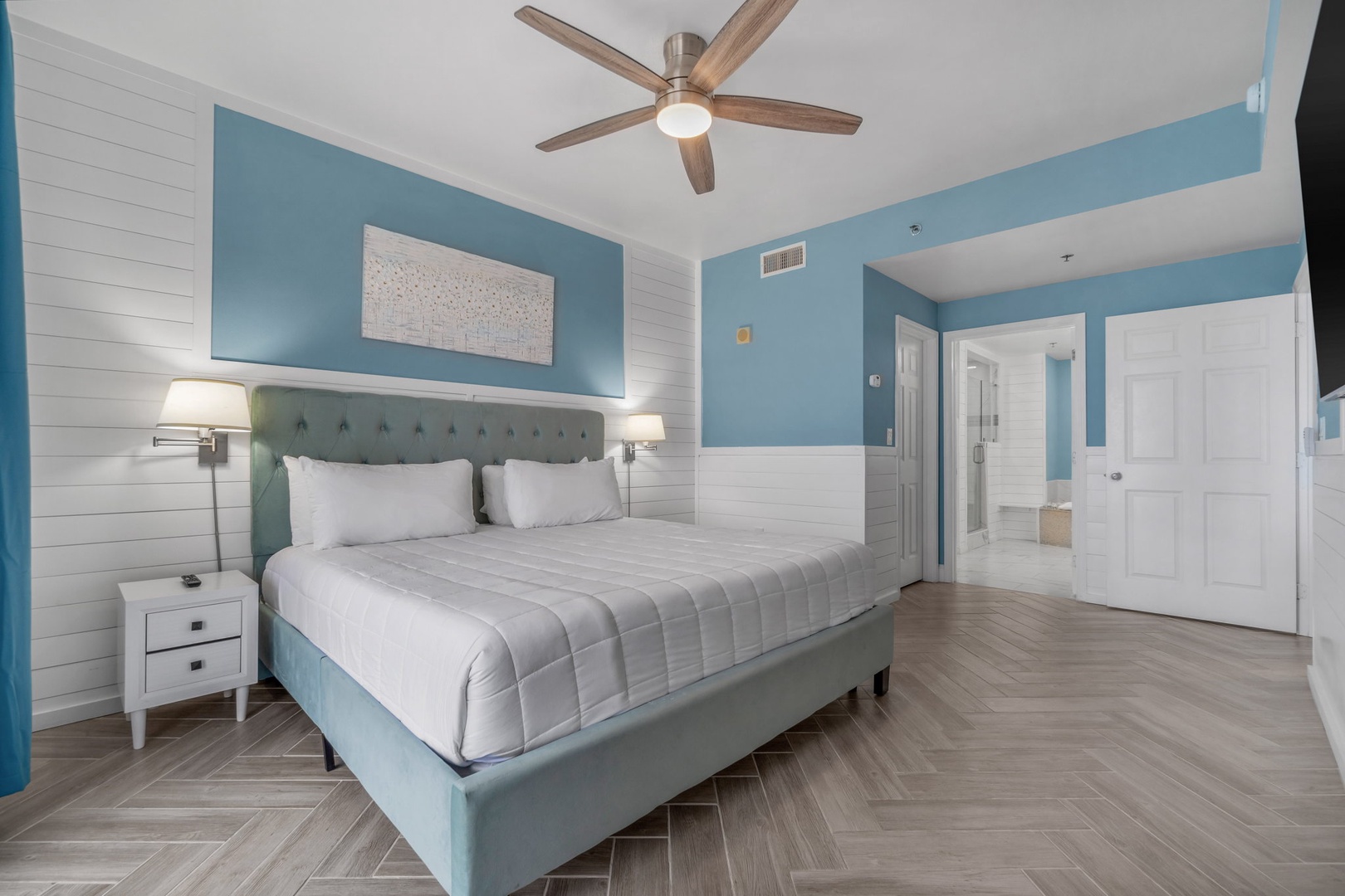 Ensuite king bedroom with balcony access