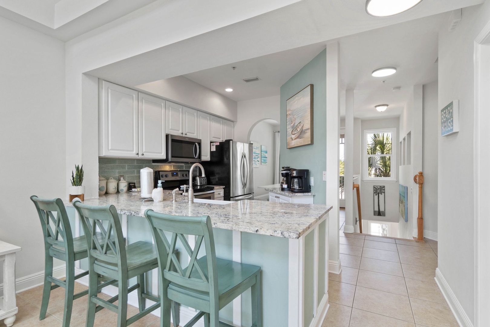 Kitchen area with bar seating