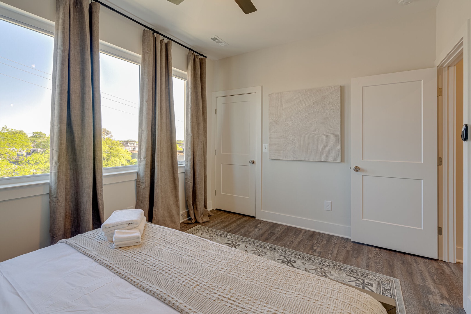 2nd Bedroom featuring a King bed and designer furnishings with ensuite bathroom.