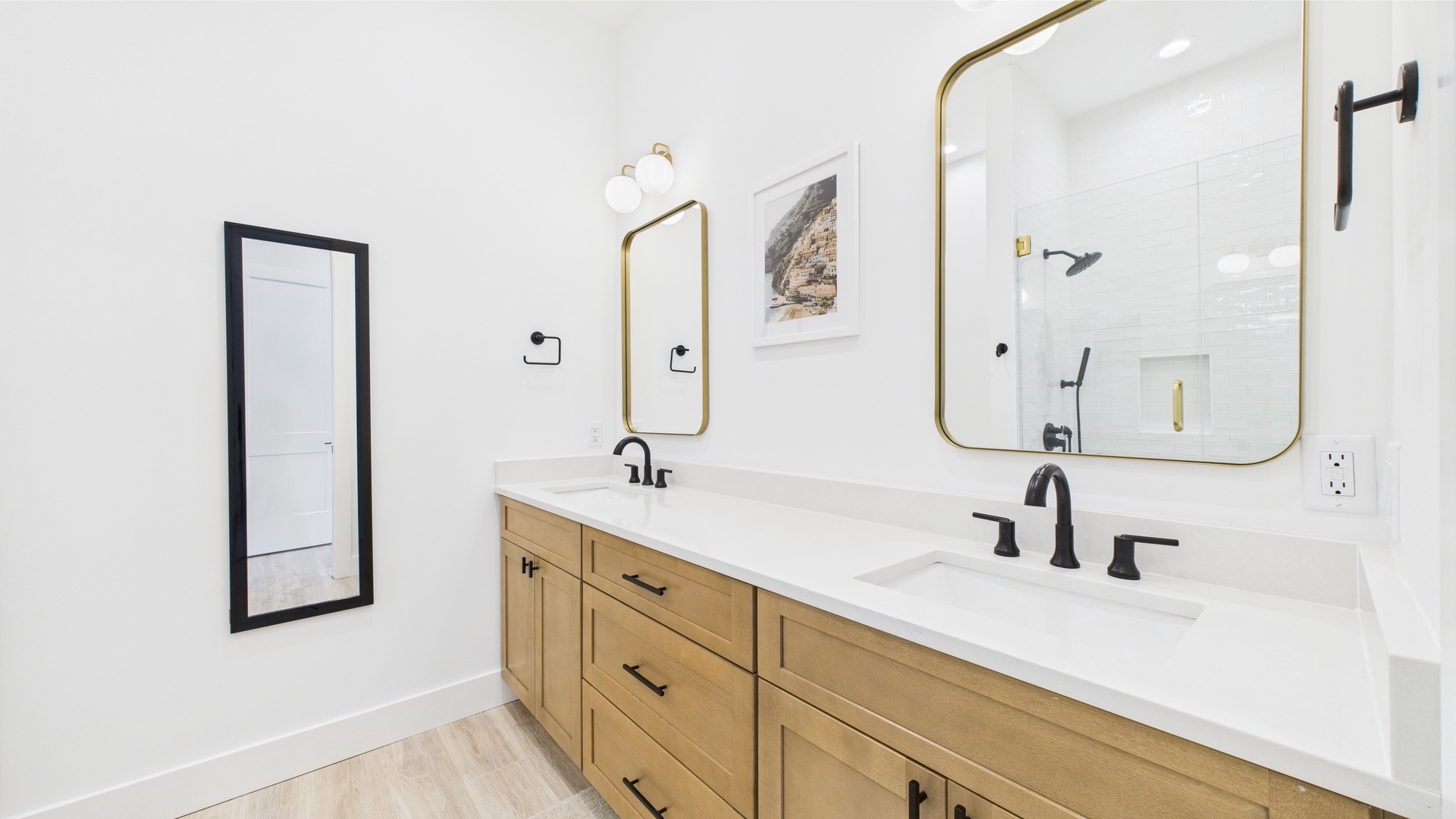 Master bathroom with dual vanity and walk in shower
