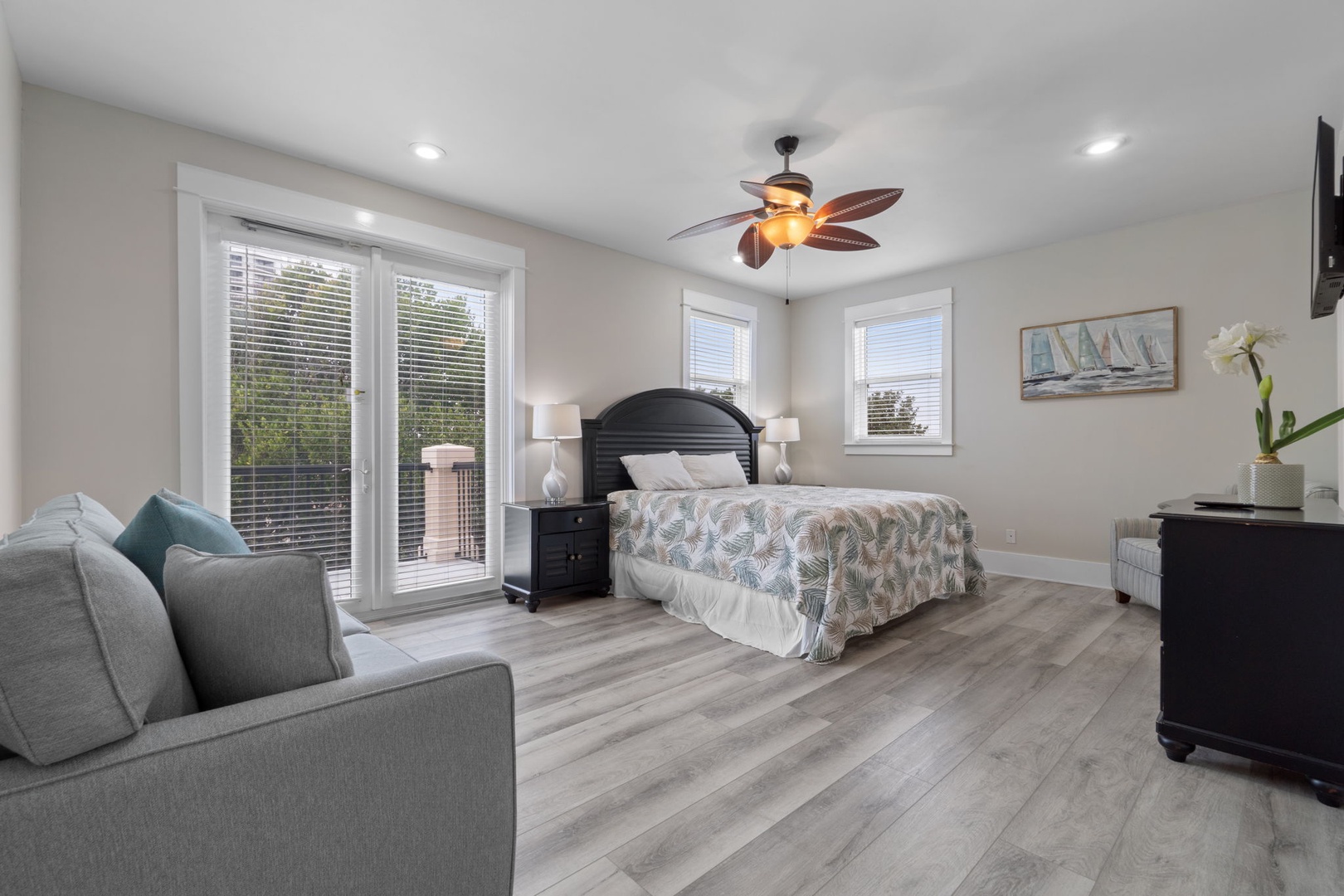 3rd floor bedroom with a king bed and queen sleeper sofa