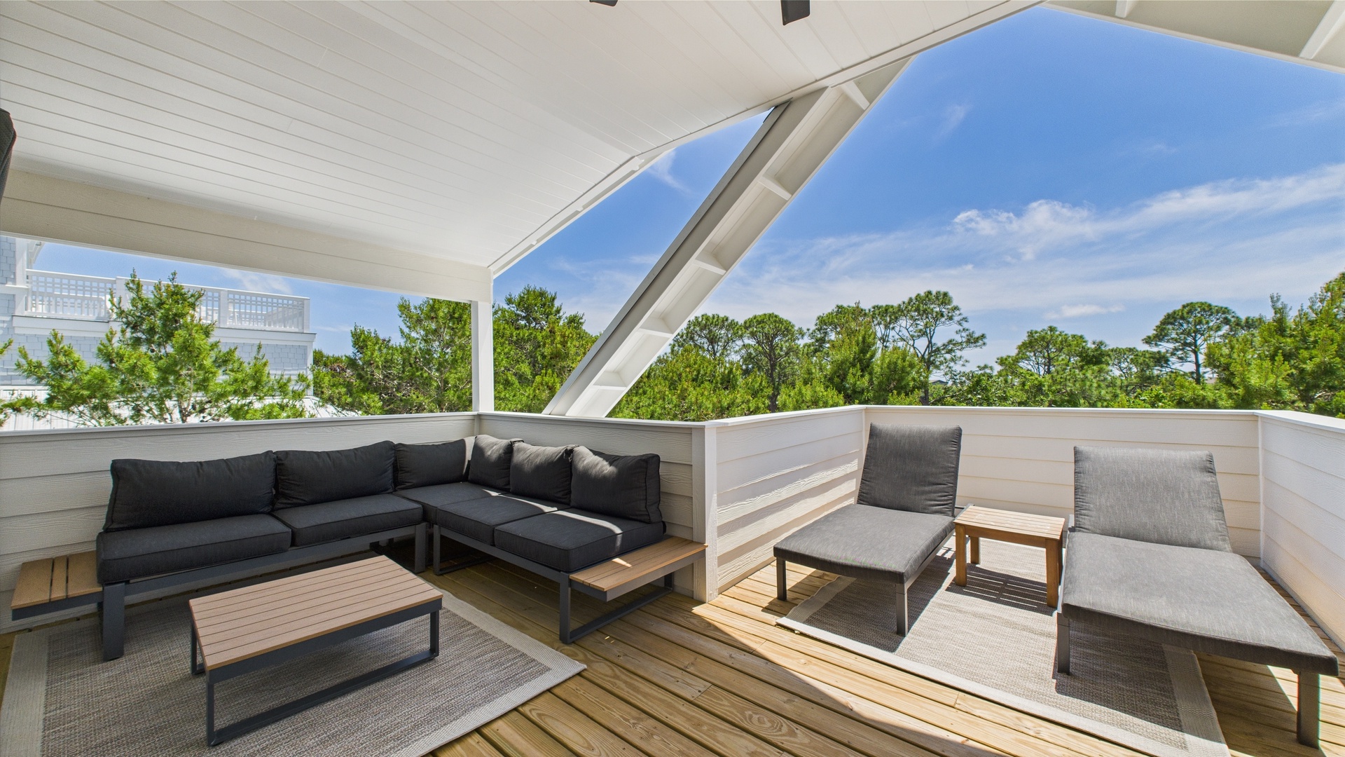 Third floor terrace with ample seating and hot tub