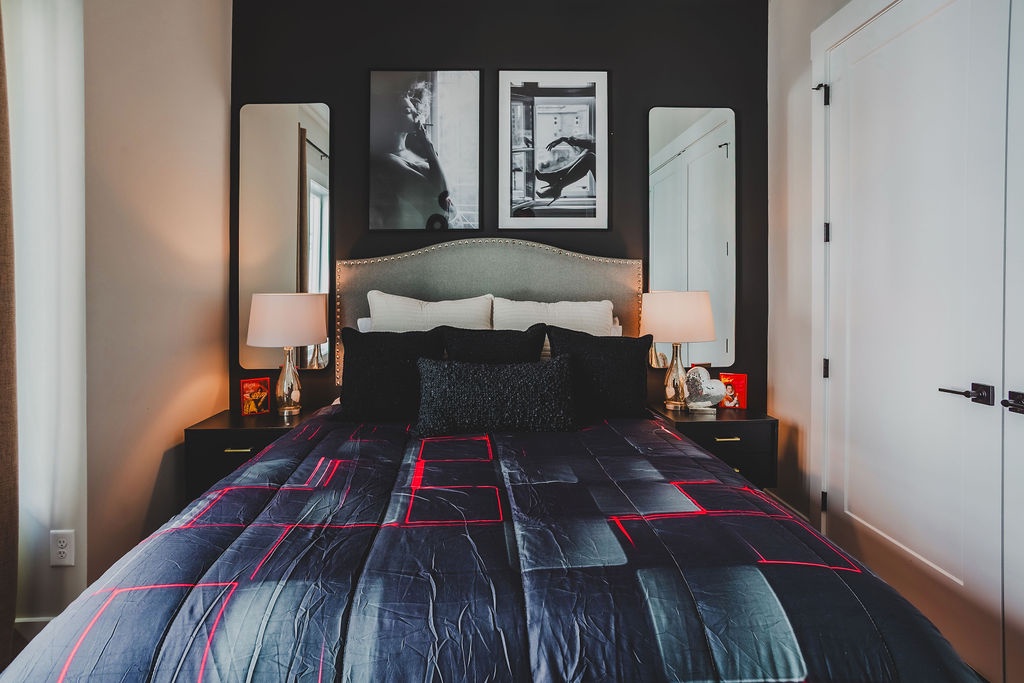 Second bedroom with queen bed and TV