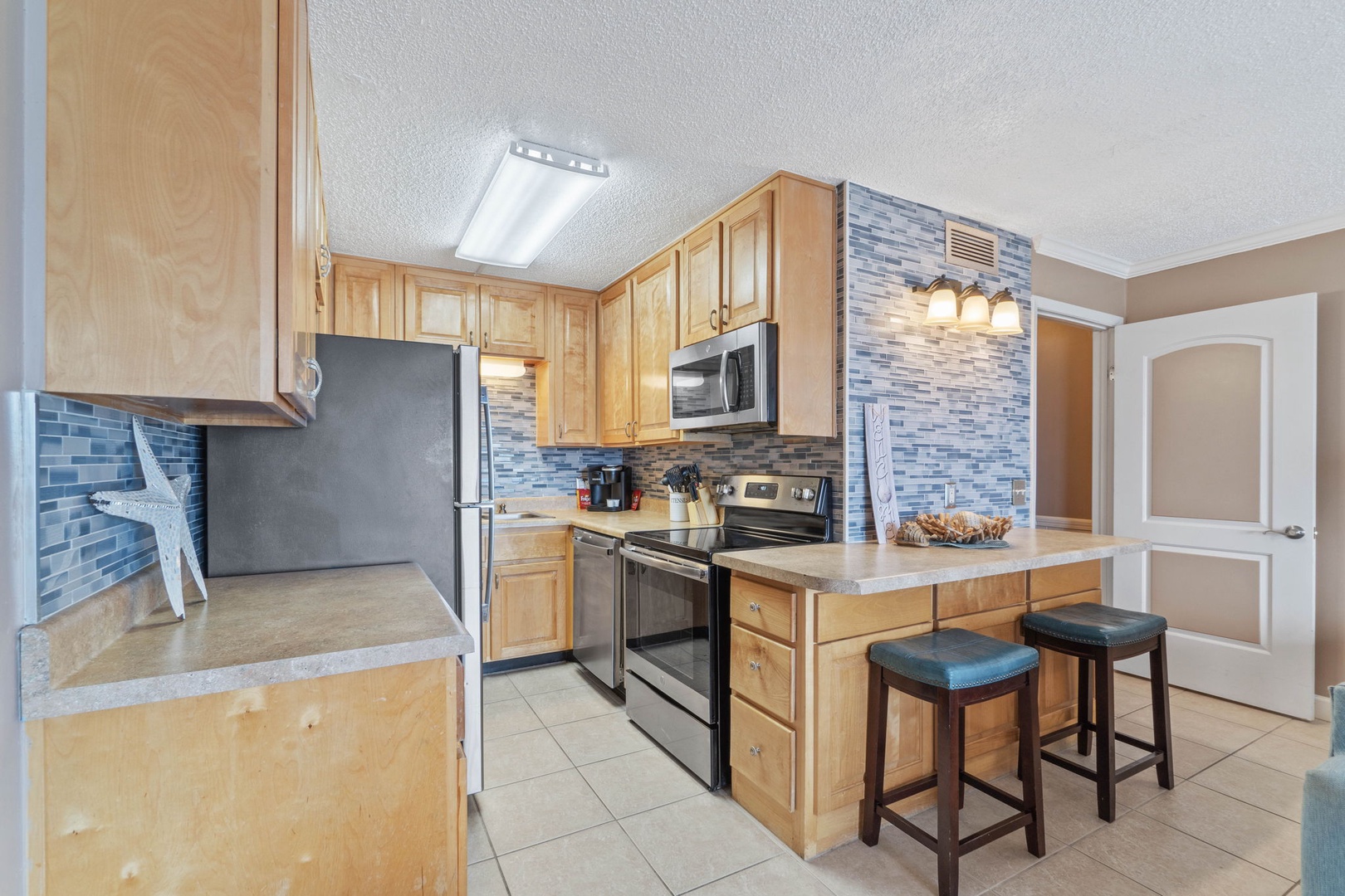 Kitchen area with bar seating