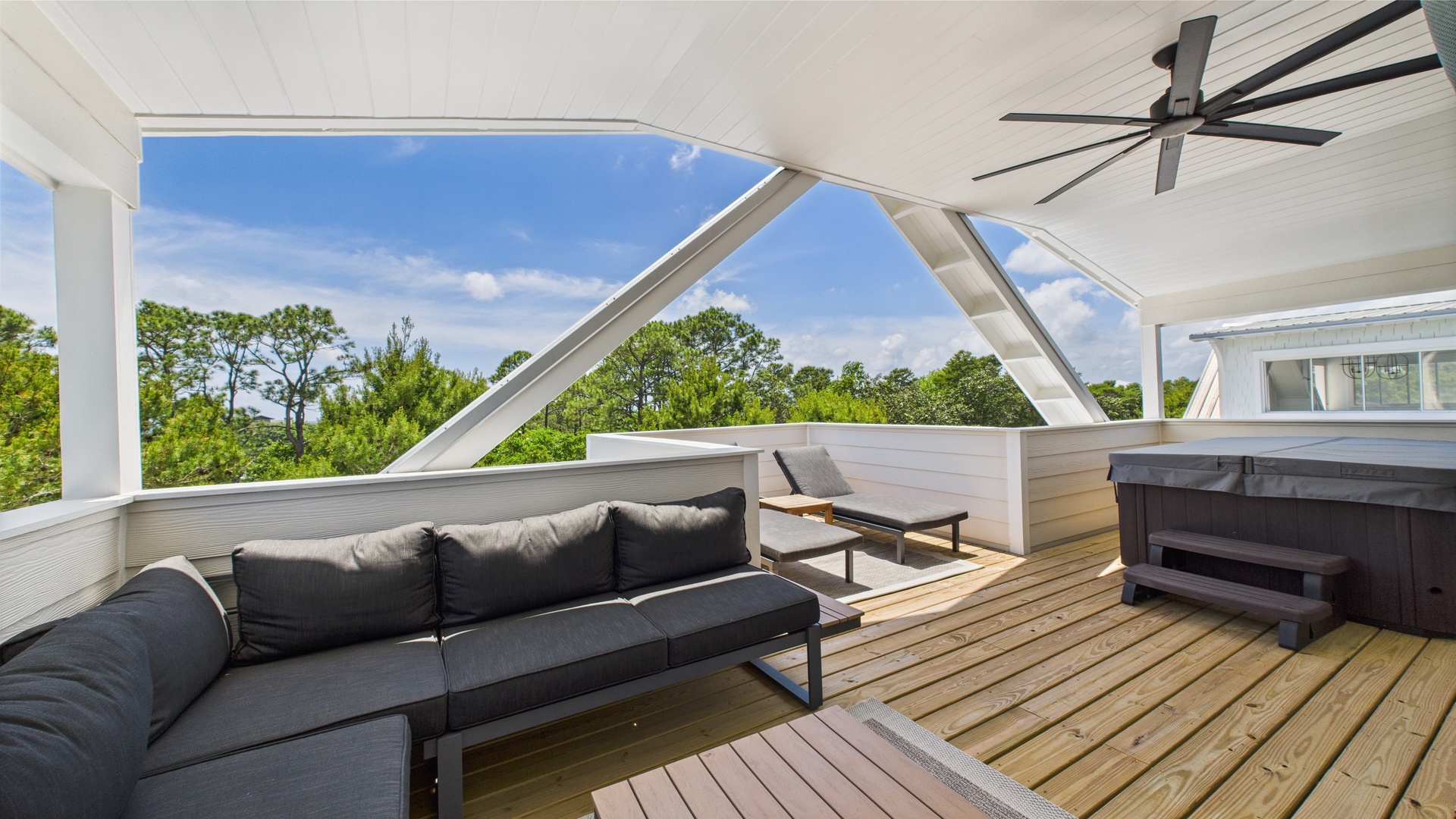 Third floor terrace with ample seating and hot tub