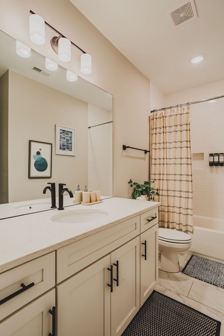 Fourth full bathroom with shower and tub combo