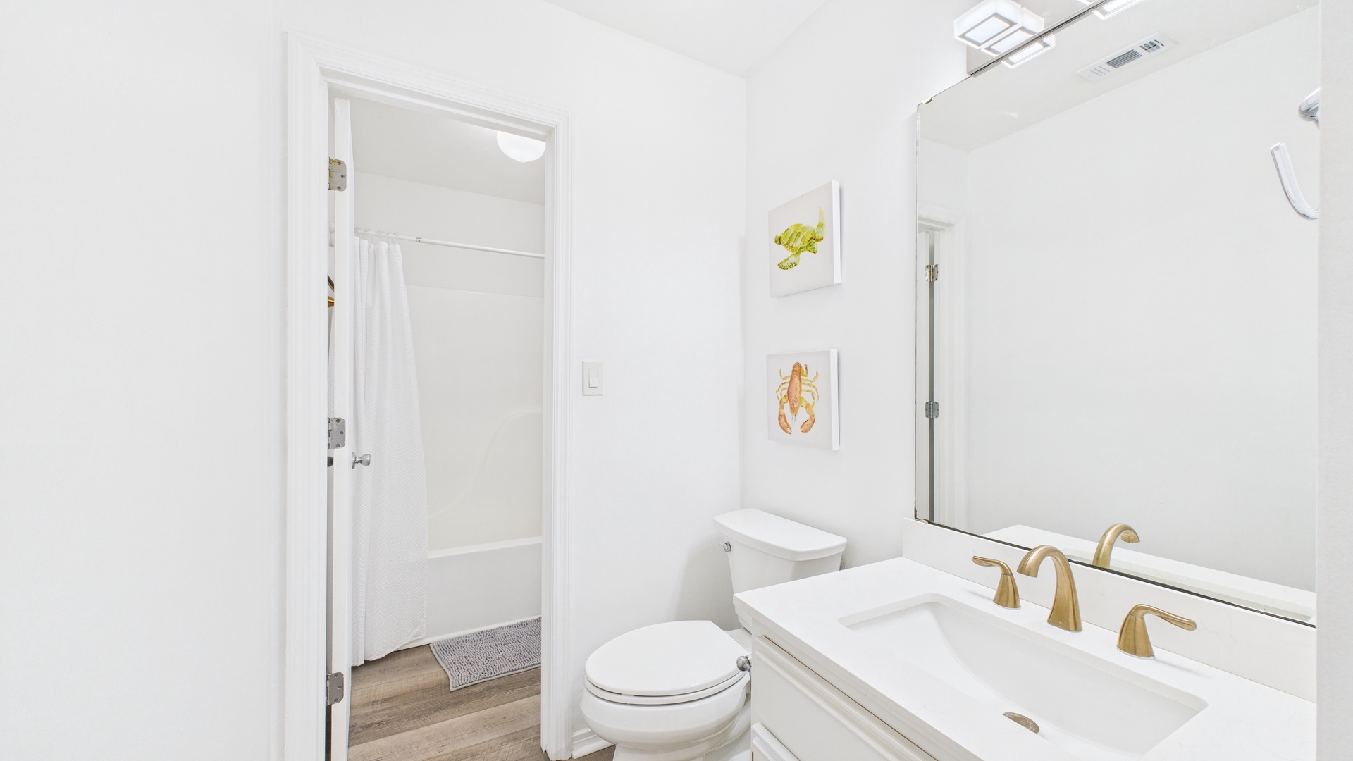 Jack and Jill bathroom with shower and tub combo