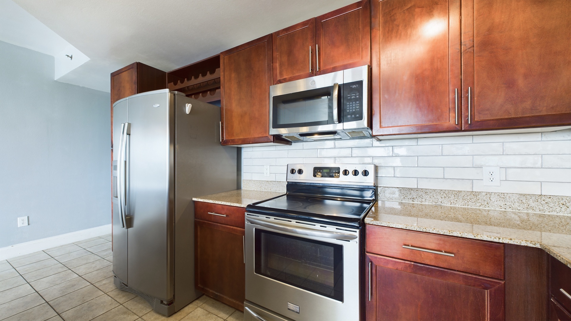 Full kitchen with updated appliances and cooking essentials
