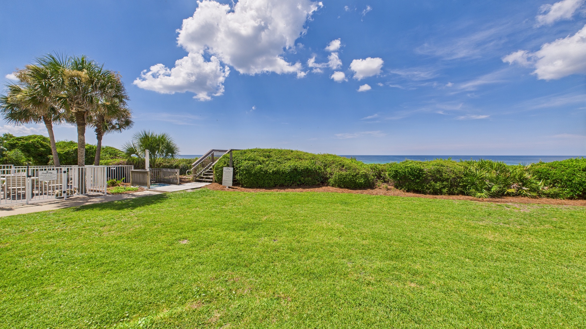 Private beach access and pool just steps away from patio
