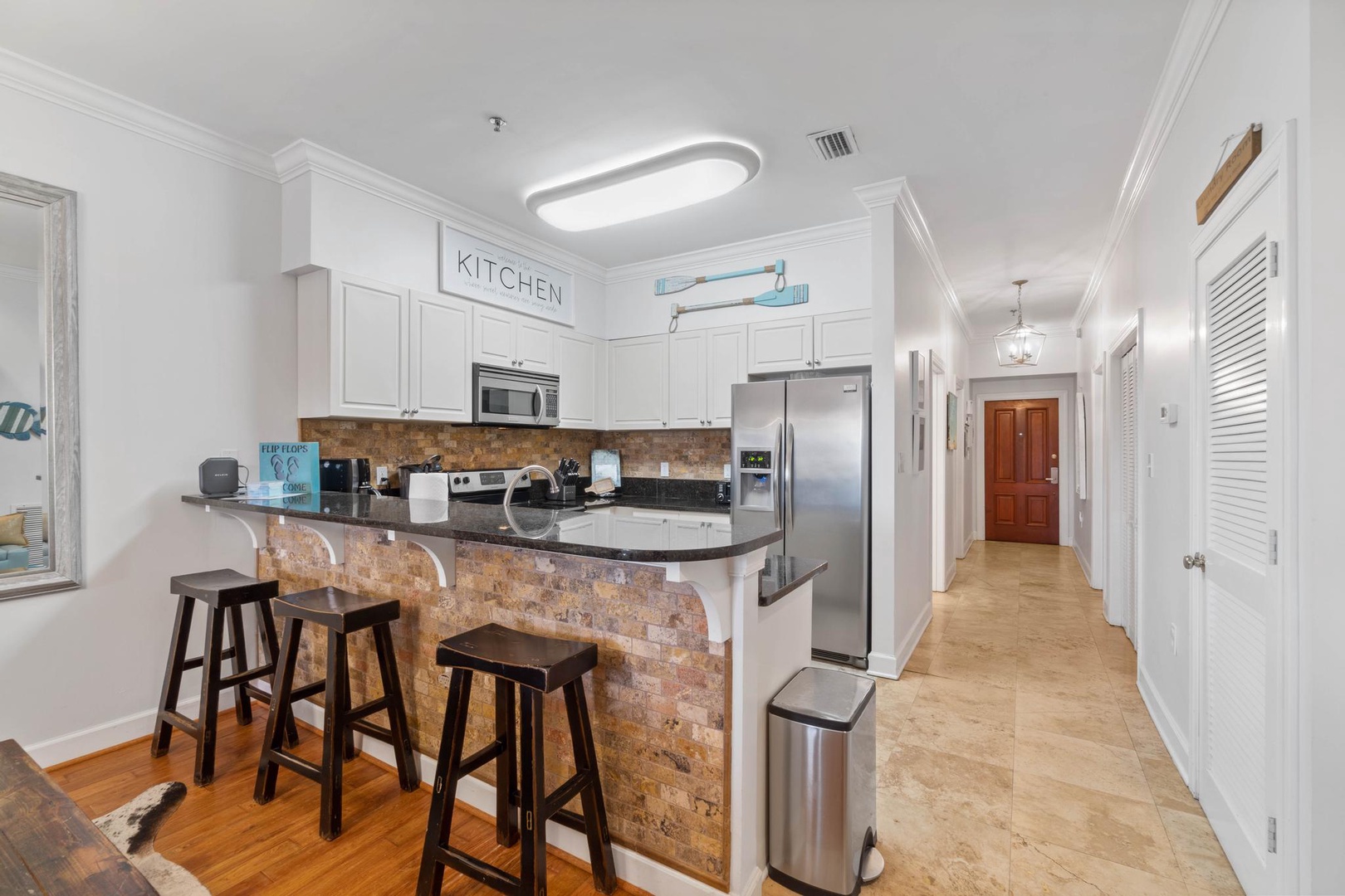 Breakfast bar with seating for three.
