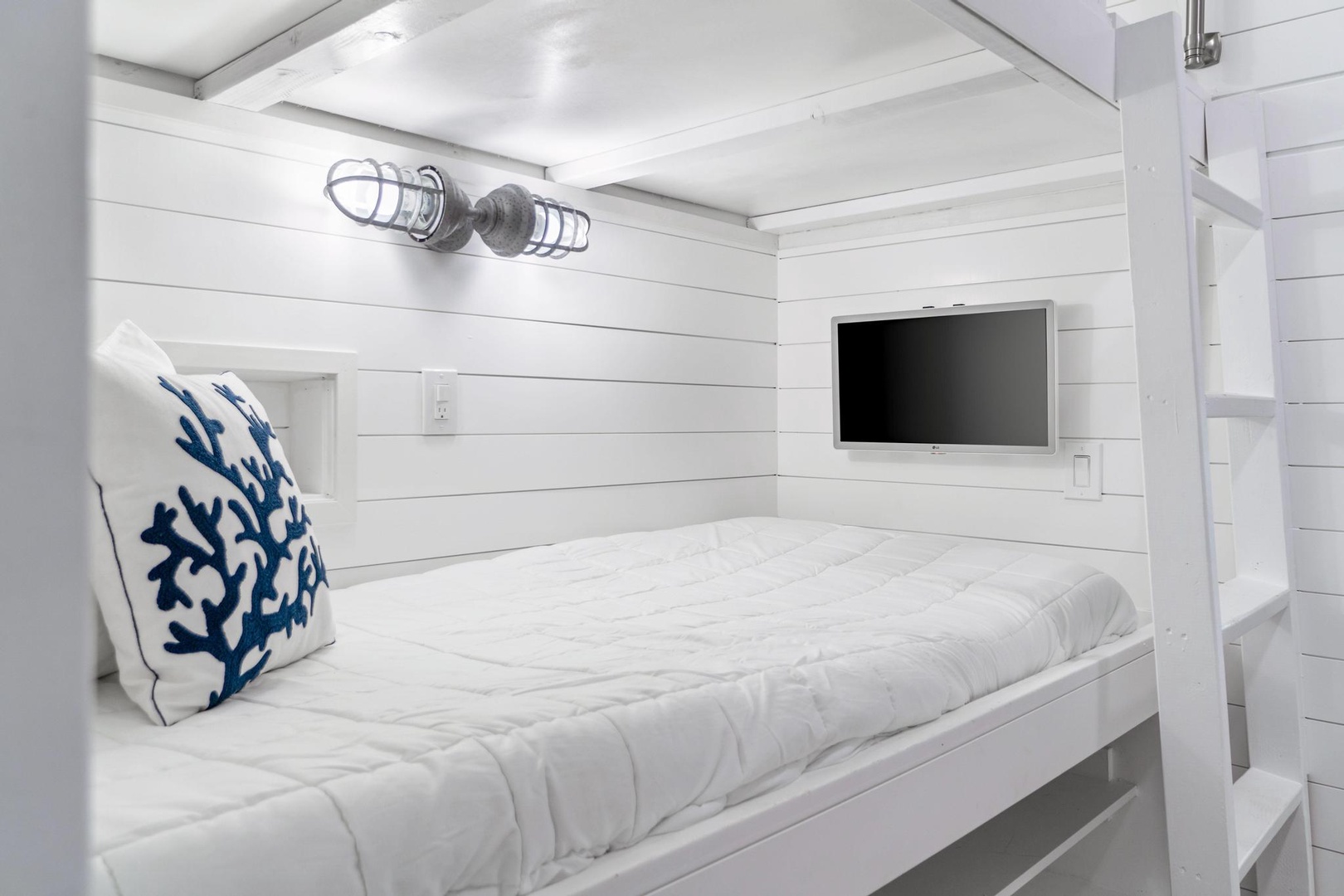 Twin bunk beds in hallway area