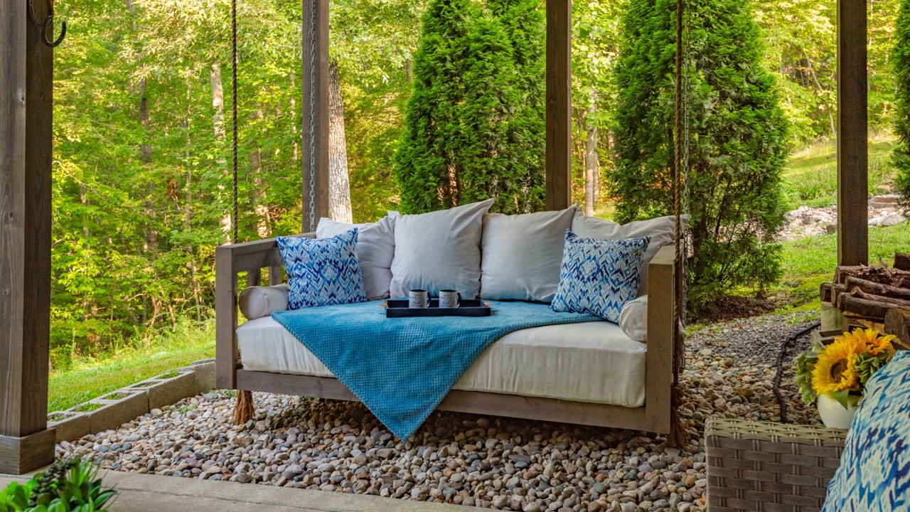 Outdoor Porch swing on the lower level