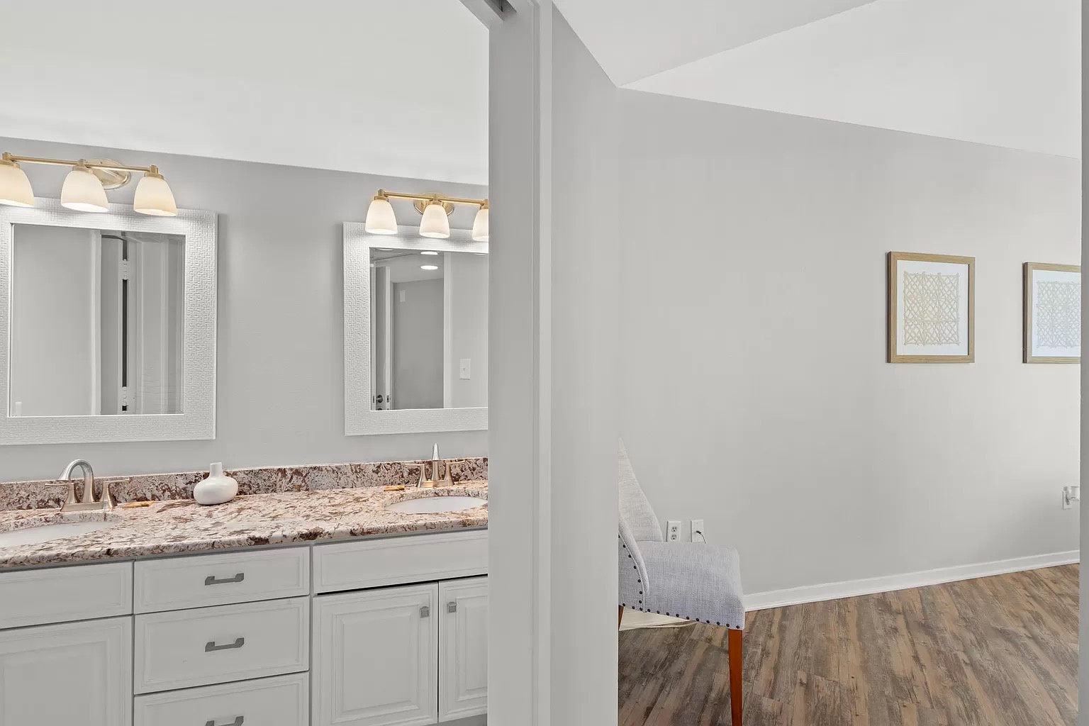 Master bedroom ensuite bathroom with double vanity and walk in shower